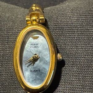 Anne Klein Gold Tone Watch with Mother of Pearl Dial